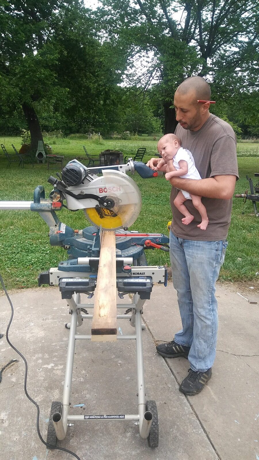 Cutting lumber with baby