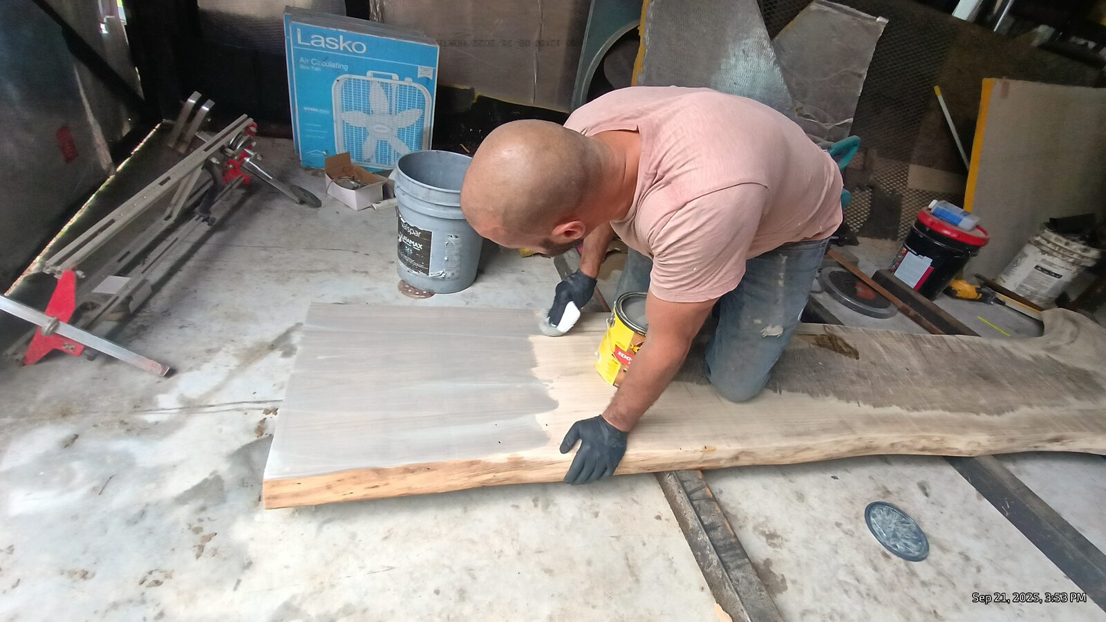 Applying the first coat of finish