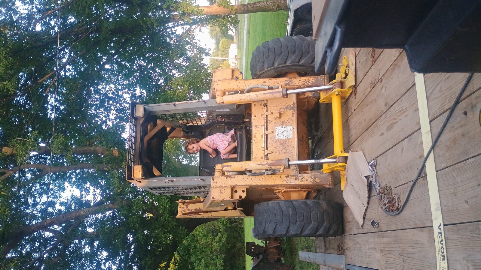 Quality control manager inspecting from the cab