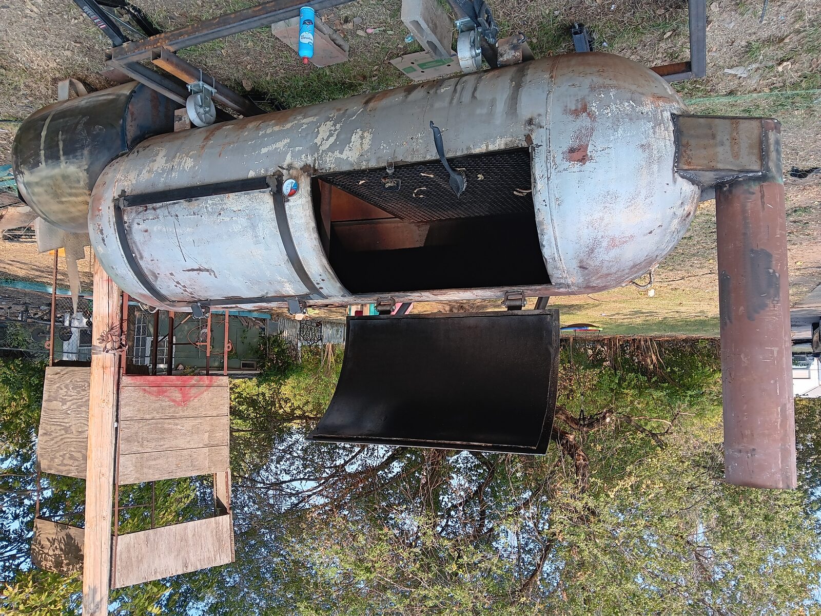 Firebox door fabricated with thermometer gauge installed