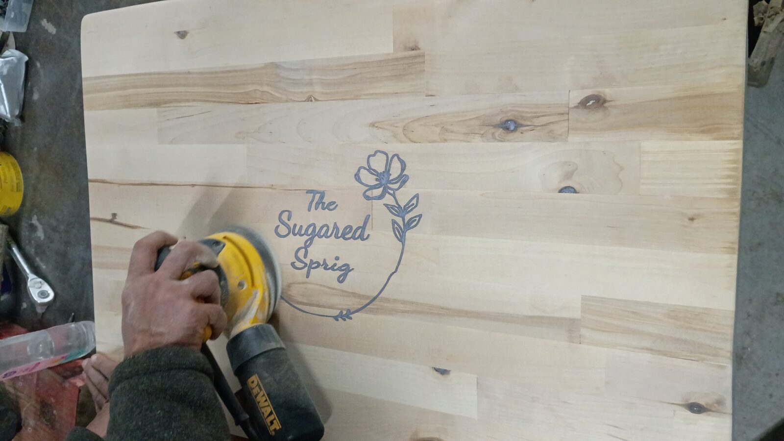 Sanding with a DeWalt orbital sander