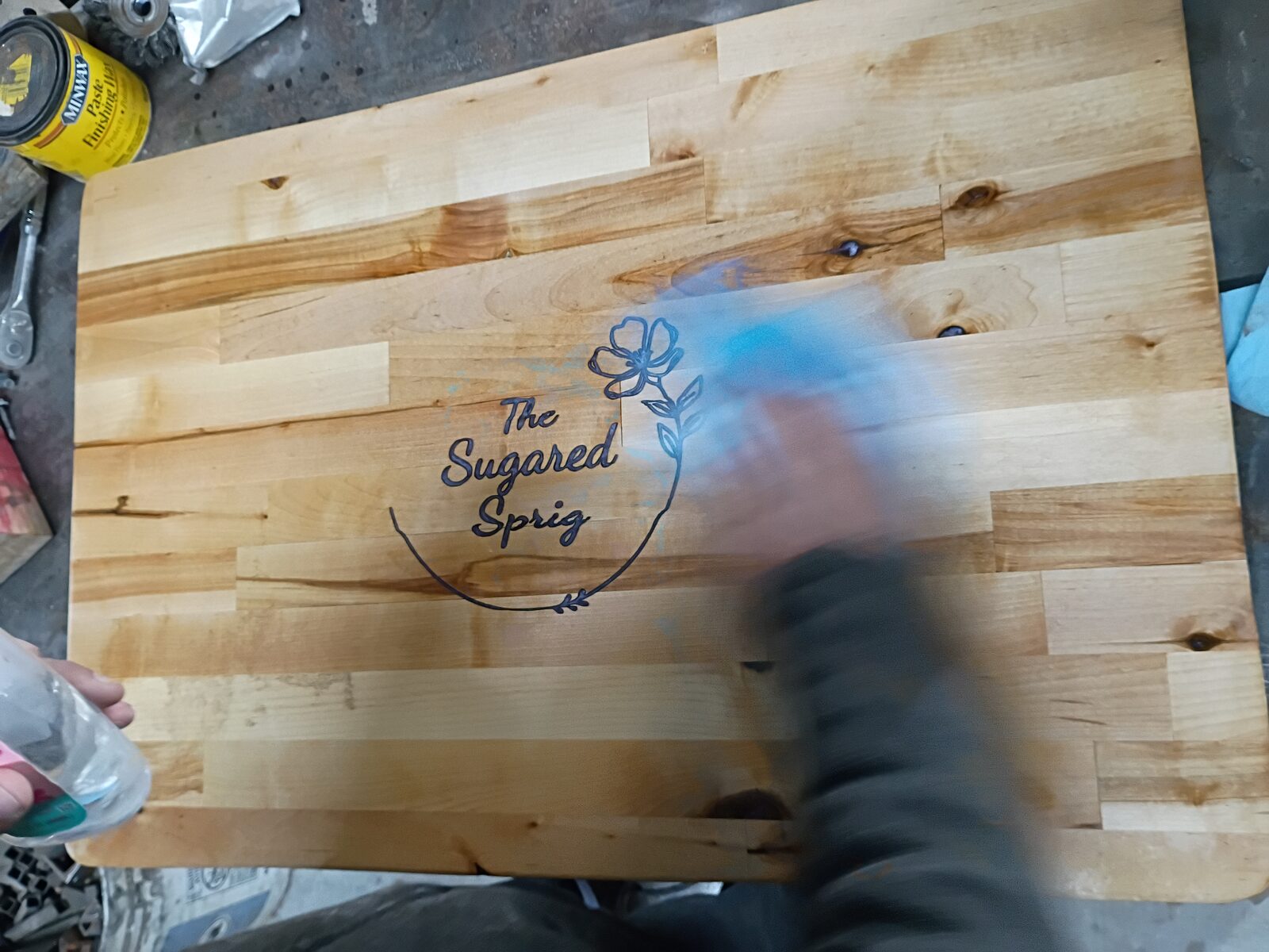 Applying Minwax finish — the grain starts to pop